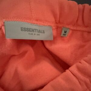 Essentials fear of god coral